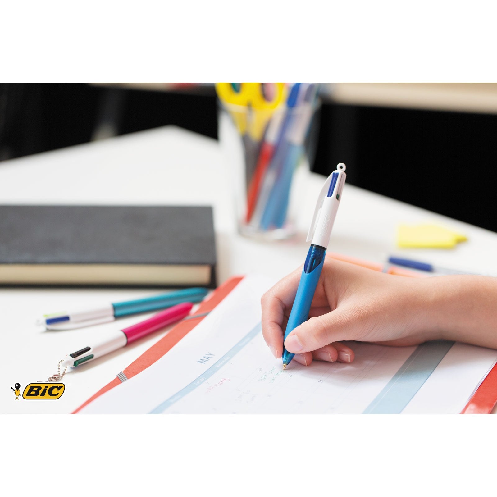 BIC 4 Colours Retractable Ballpoint Pens - Medium 1.0mm Point, Comfort Grip, Assorted Ink, Pack of 3 Blue Barrels 2