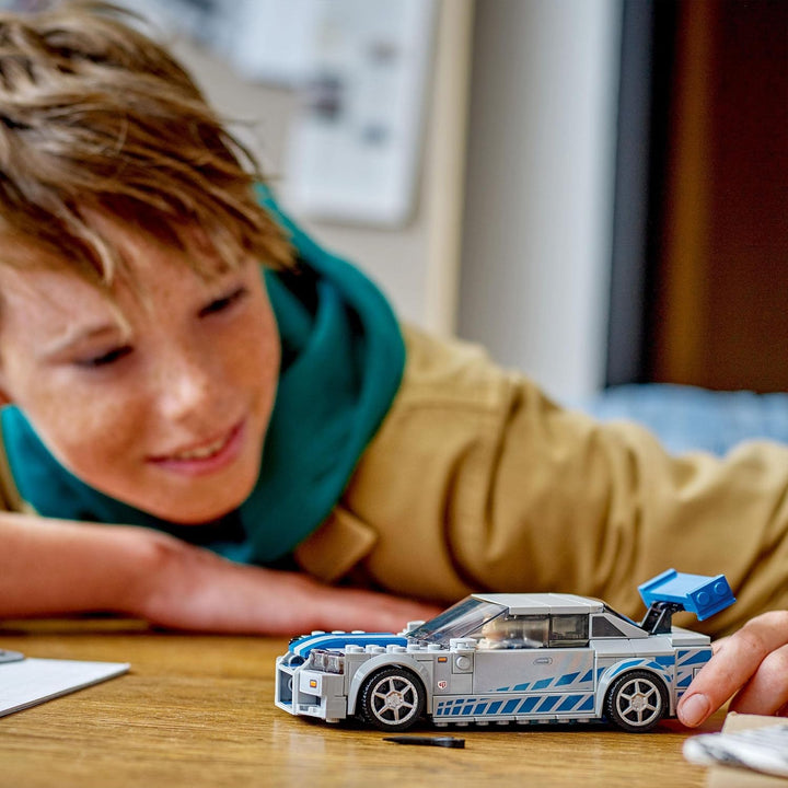 LEGO Speed Champions Nissan Skyline GT-R (R34) Race Car - 319-Piece Building Set for Ages 9+