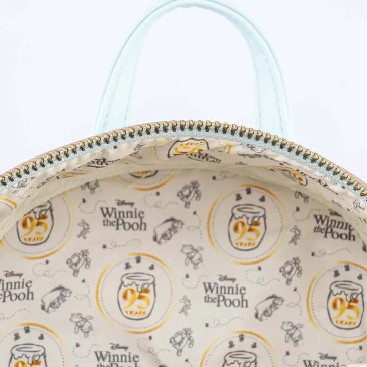 Loungefly Disney Winnie the Pooh 95th Anniversary Celebration Toss Mini-Rucksack für Damen