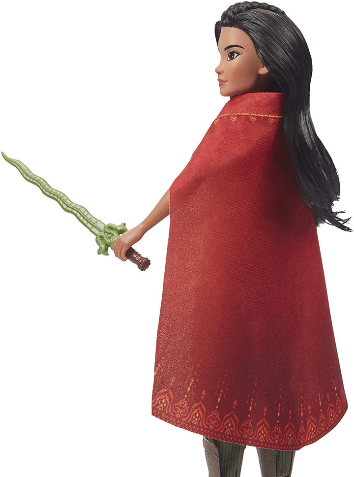 Bambola alla moda Disney Raya con vestiti, scarpe e spada