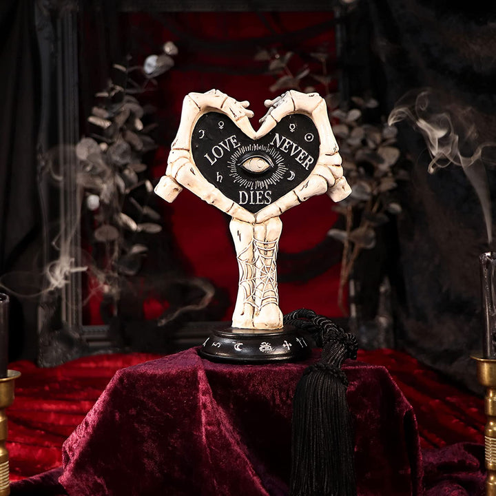 Nemesis Now Love Never Dies Skeleton Hand Heart Figurine, Black, 21.5cm